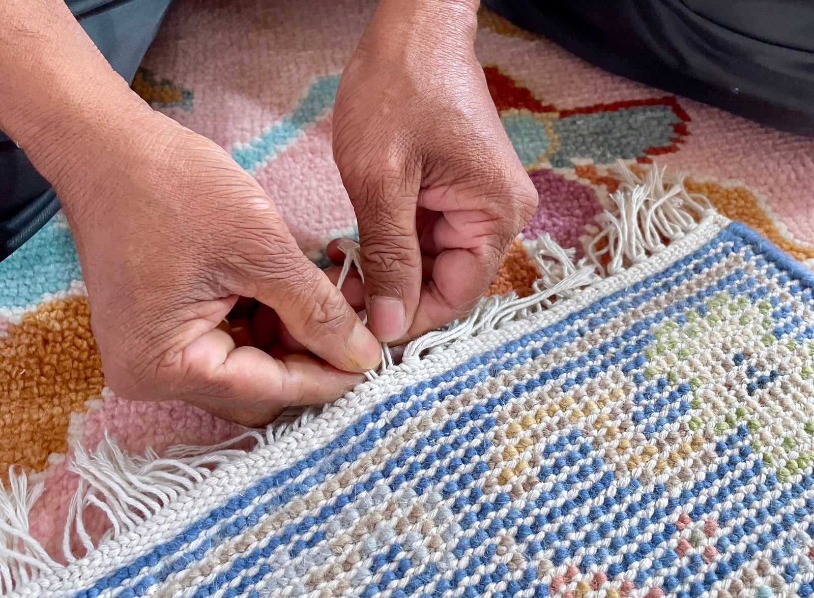 The Art of 
Hand-Knotted Rugs
